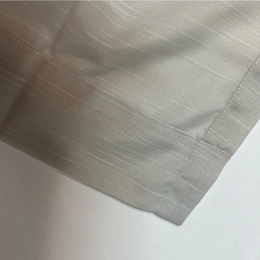 2pk (42” W x 84” L) Light Filtering Curtain Panel - Room Essentials ™ in Beige.